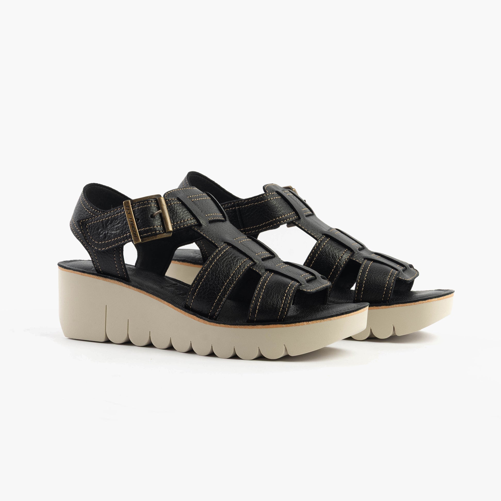 Fly London YUDD236FLY Womens Sandals Black side view featuring leather upper and wedge heel.