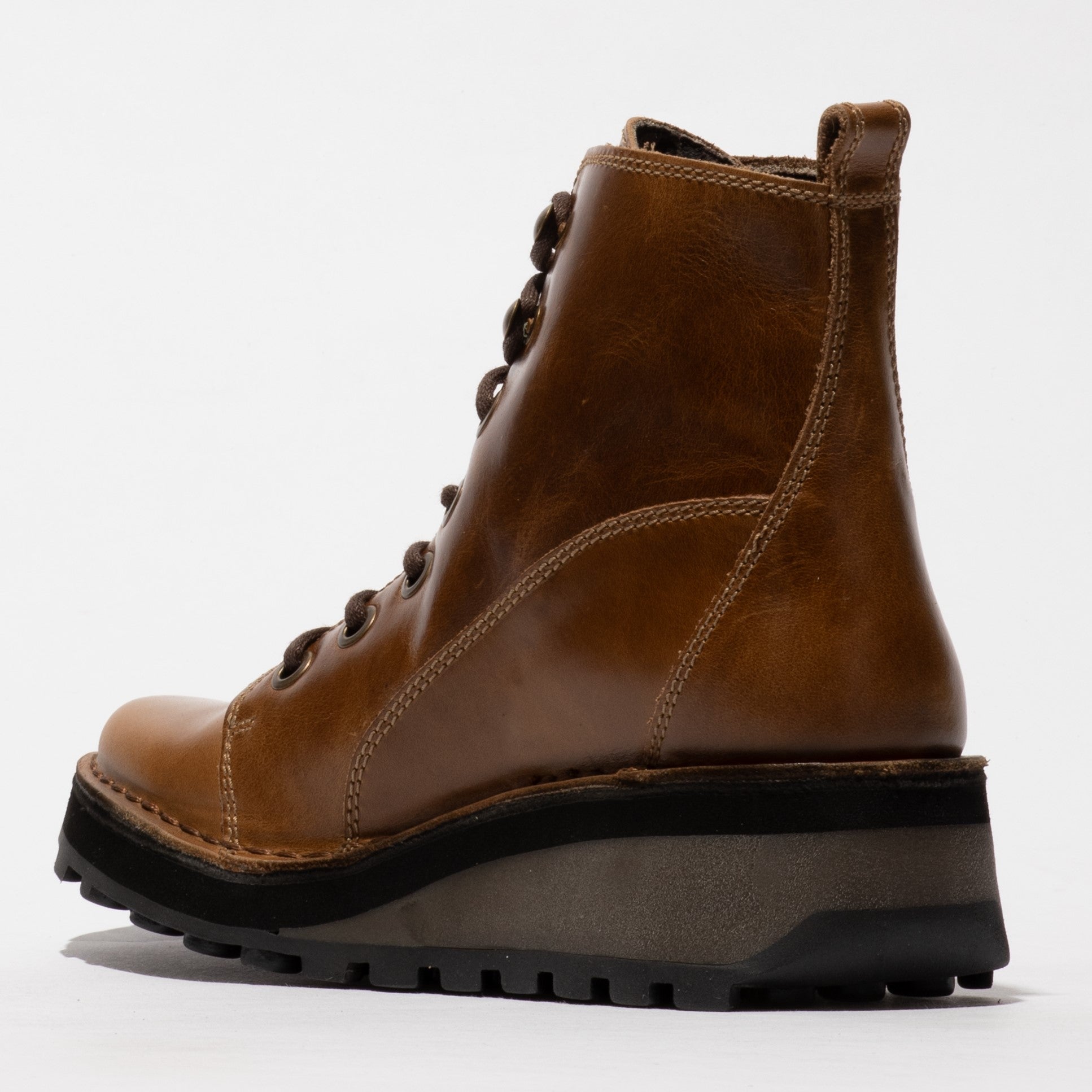 Fly London HAZI147FLY Womens Boots Camel side view showing leather upper, lace-up design, and wedge sole.