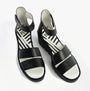 Fly London BONO290FLY Womens Sandals Black top view displaying leather straps and wedge heel.