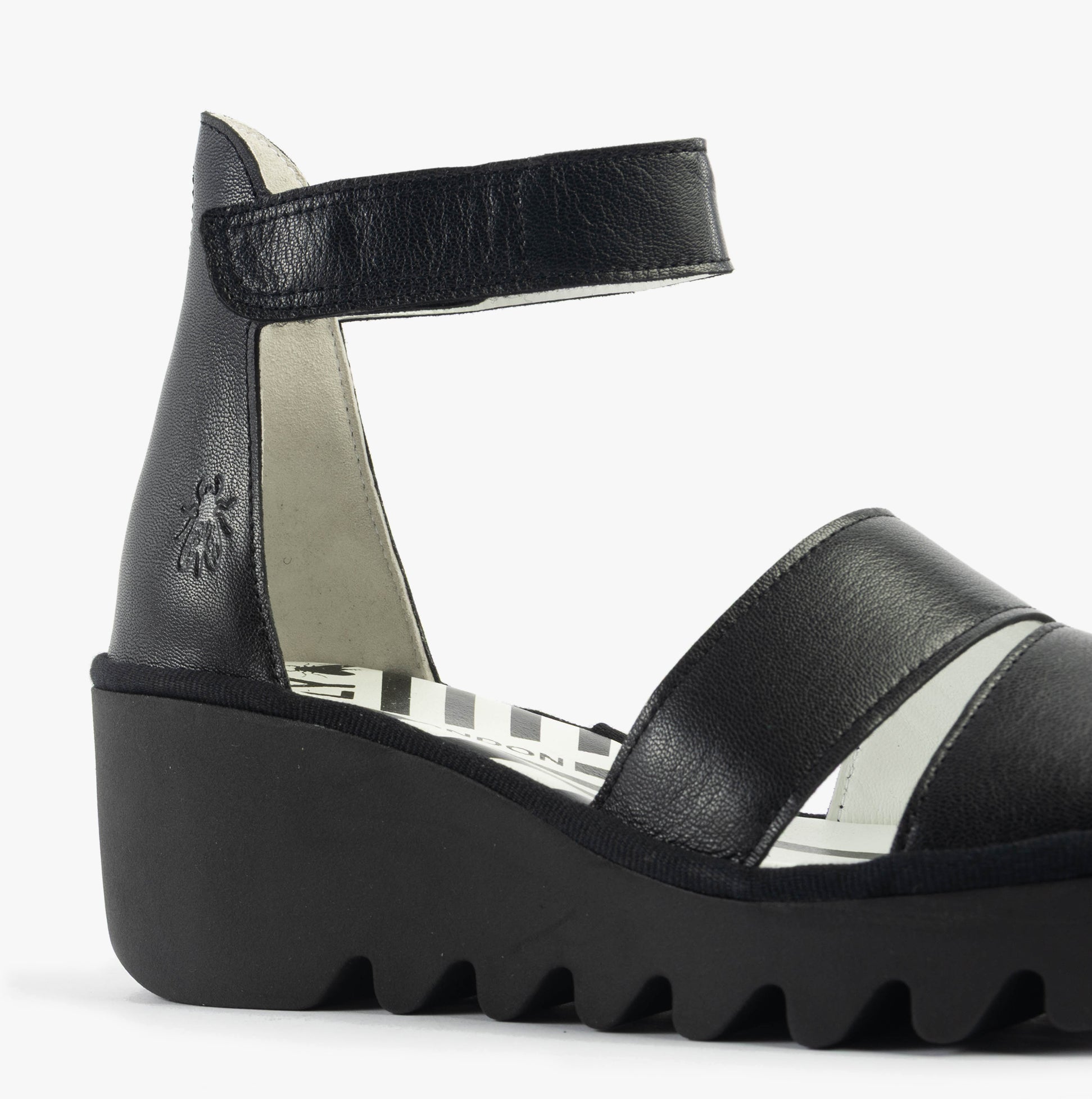 Fly London BONO290FLY Womens Sandals Black side view showing leather upper and wedge heel design