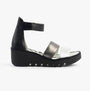 Fly London BONO290FLY Womens Sandals Silver/Graphite/Black side view showing wedge heel and leather upper material.