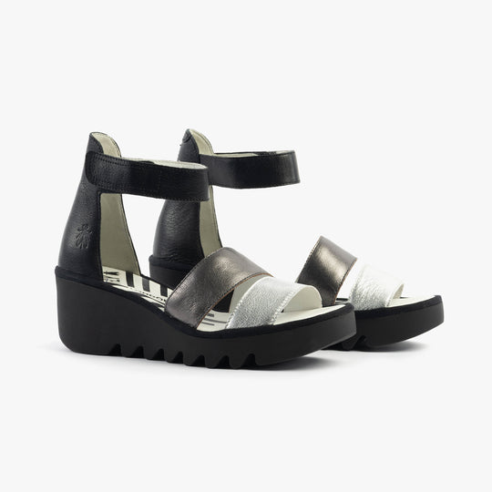 Fly London BONO290FLY Womens Sandals Silver/Graphite/Black side view showcasing leather upper and wedge heel.