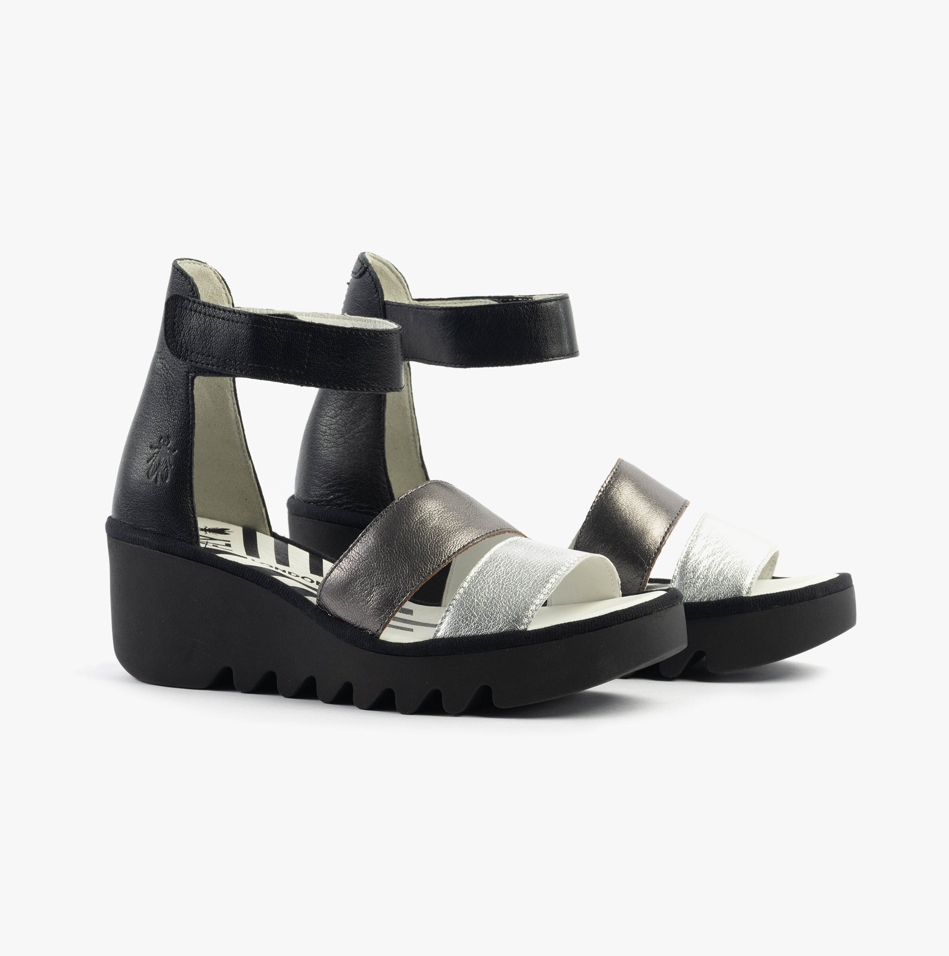 Fly London BONO290FLY Womens Sandals Silver/Graphite/Black side view showcasing leather upper and wedge heel.