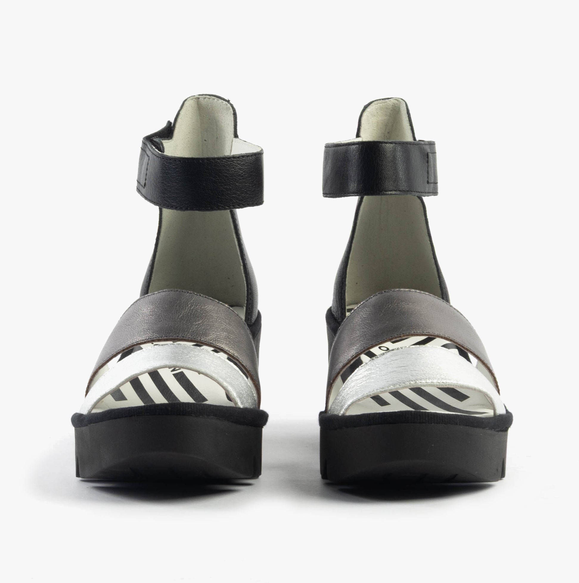 Fly London BONO290FLY Womens Sandals Silver/Graphite/Black front view showcasing the stylish wedge design with strap.