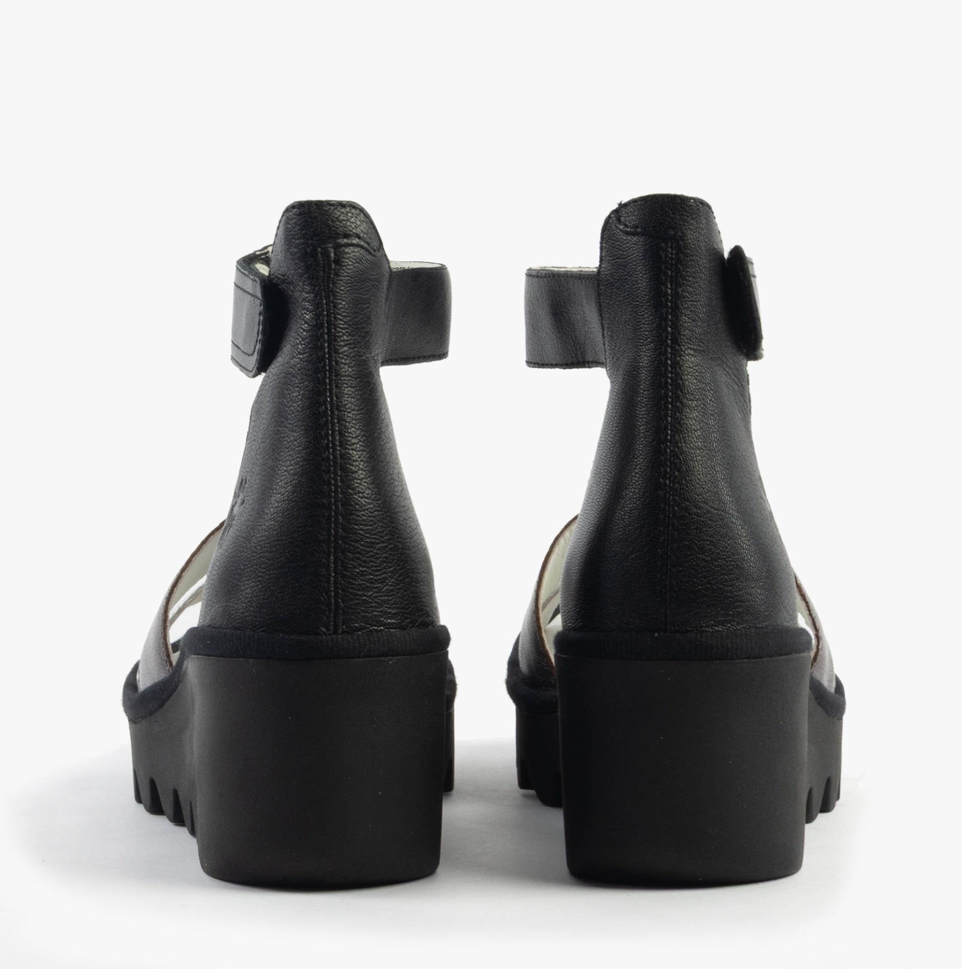 Fly London BONO290FLY Womens Sandals Silver/Graphite/Black rear view showing leather upper and wedge heel design.