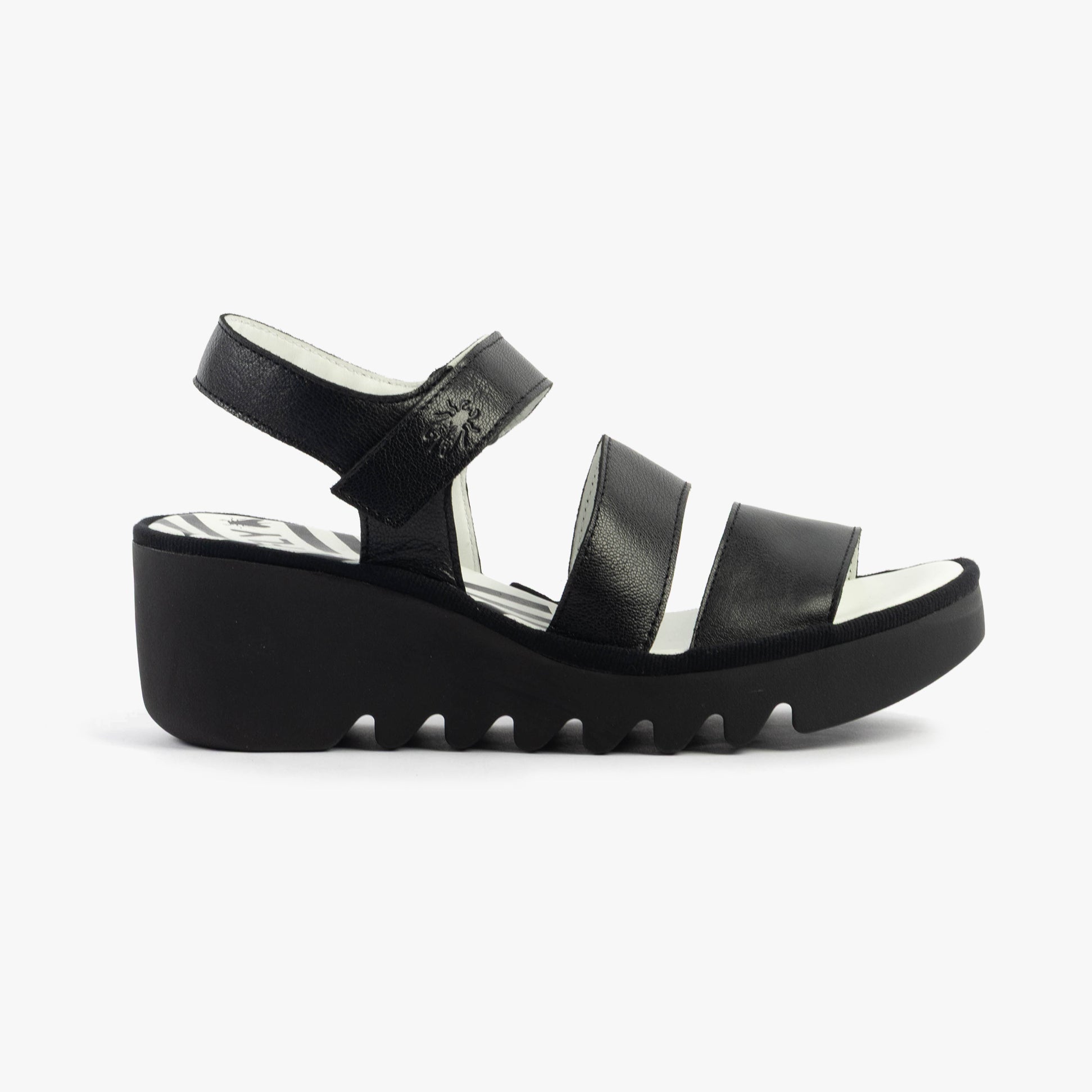 Fly London BEXY575FLY Womens Sandals Black side view with wedge heel and touch fasten straps.