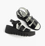 Fly London BEXY575FLY Womens Sandals Black top view showing leather straps and wedge sole design.