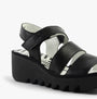 Fly London BEXY575FLY Womens Sandals Black side view showing leather upper and wedge heel