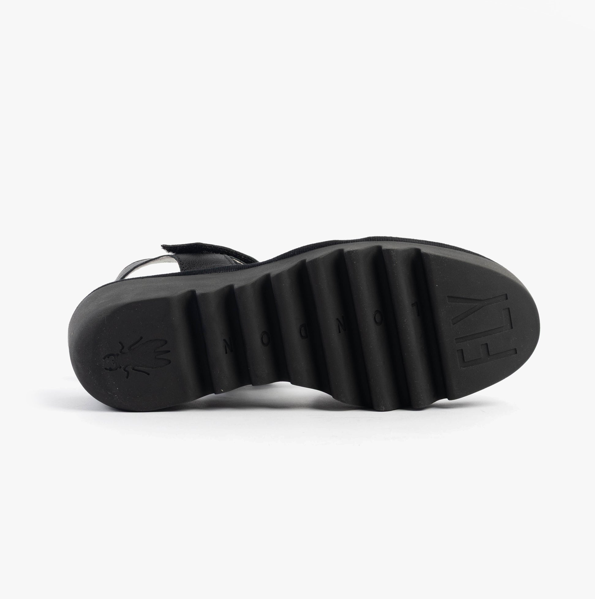 Fly London BEXY575FLY Womens Sandals Silver/Graphite/Black bottom view showing rubber sole with branding.