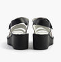 Fly London BEXY575FLY Womens Sandals Silver/Graphite/Black back view, showcasing wedge heel and leather straps.