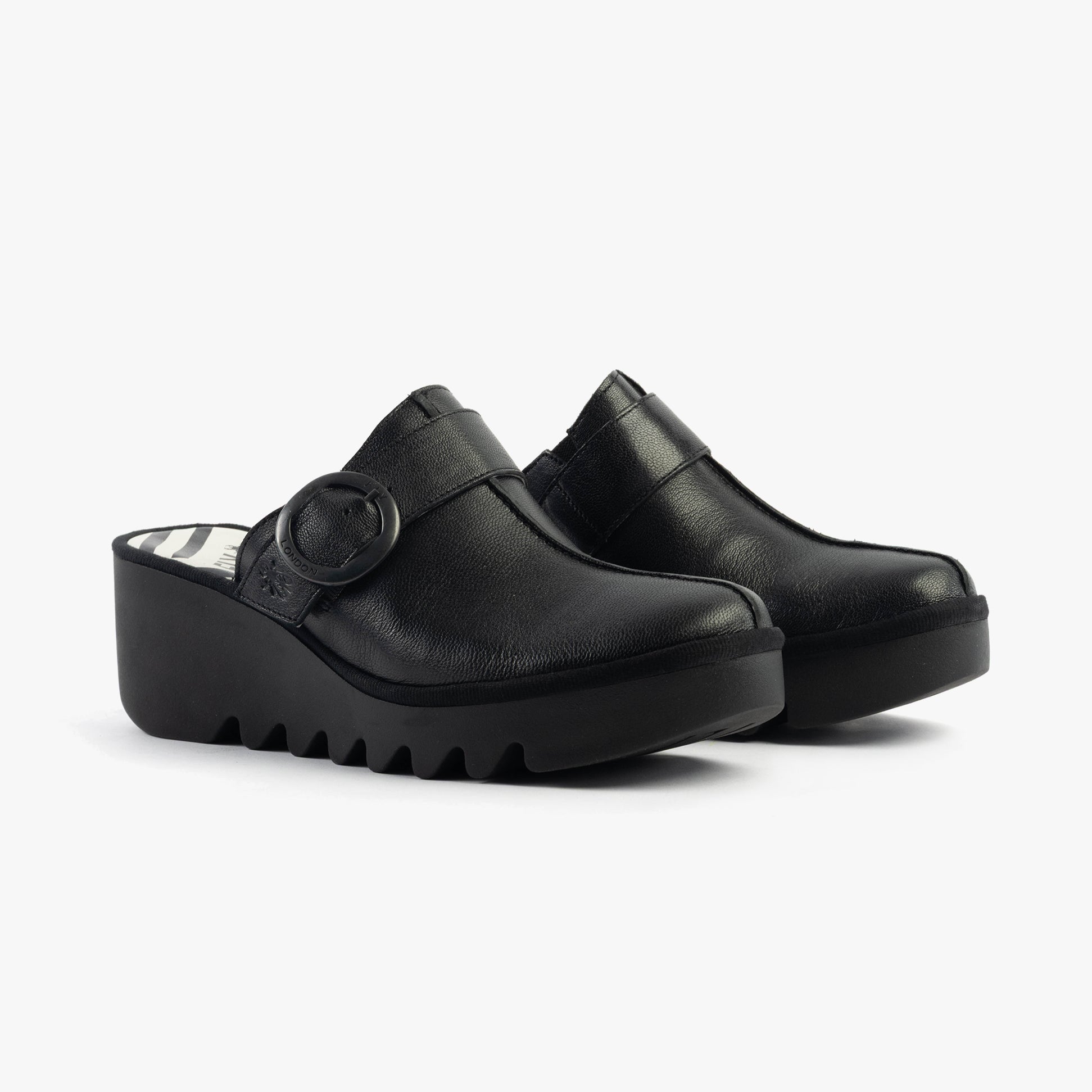 Fly London BLOK586FLY Womens Sandals Black side view showing leather upper and wedge heel design.