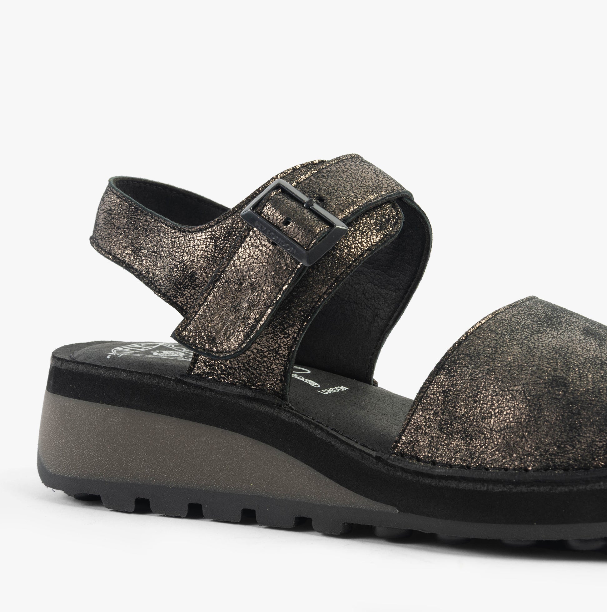 Fly London HALY559FLY Womens Sandals Graphite side view showcasing the leather upper and buckle closure.