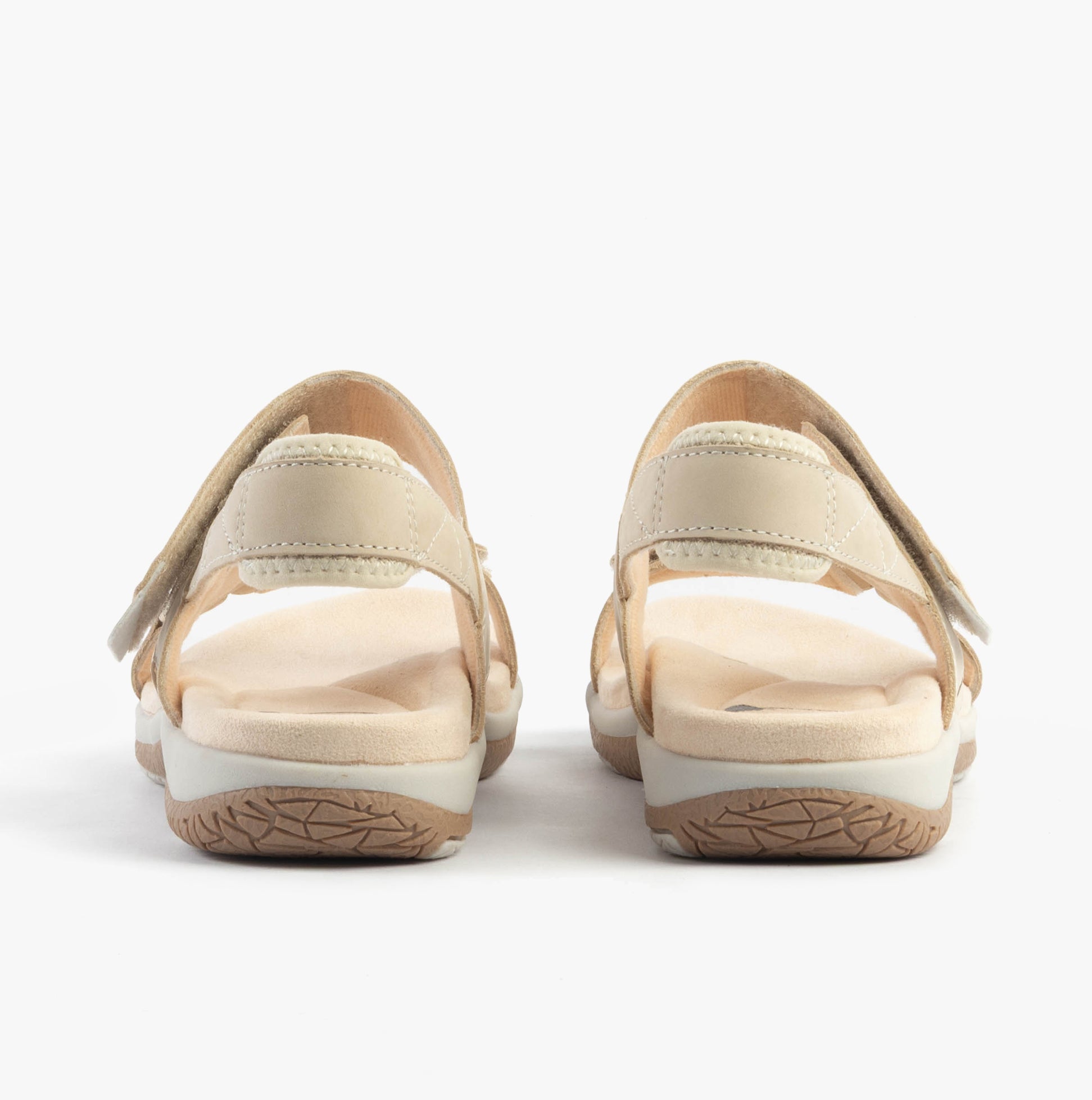 Free Spirit ELARA Womens Sandals Parchment back view showcasing the leather upper and rubber sole.