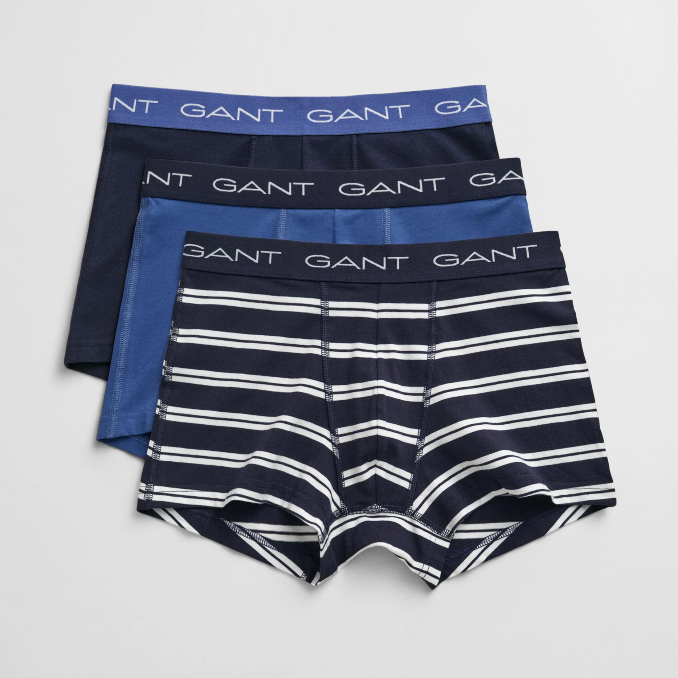 GANT STRIPE TRUNK 3-Pack Mens Evening Blue, front view of three trunks featuring navy and striped designs with GANT logo waistbands.