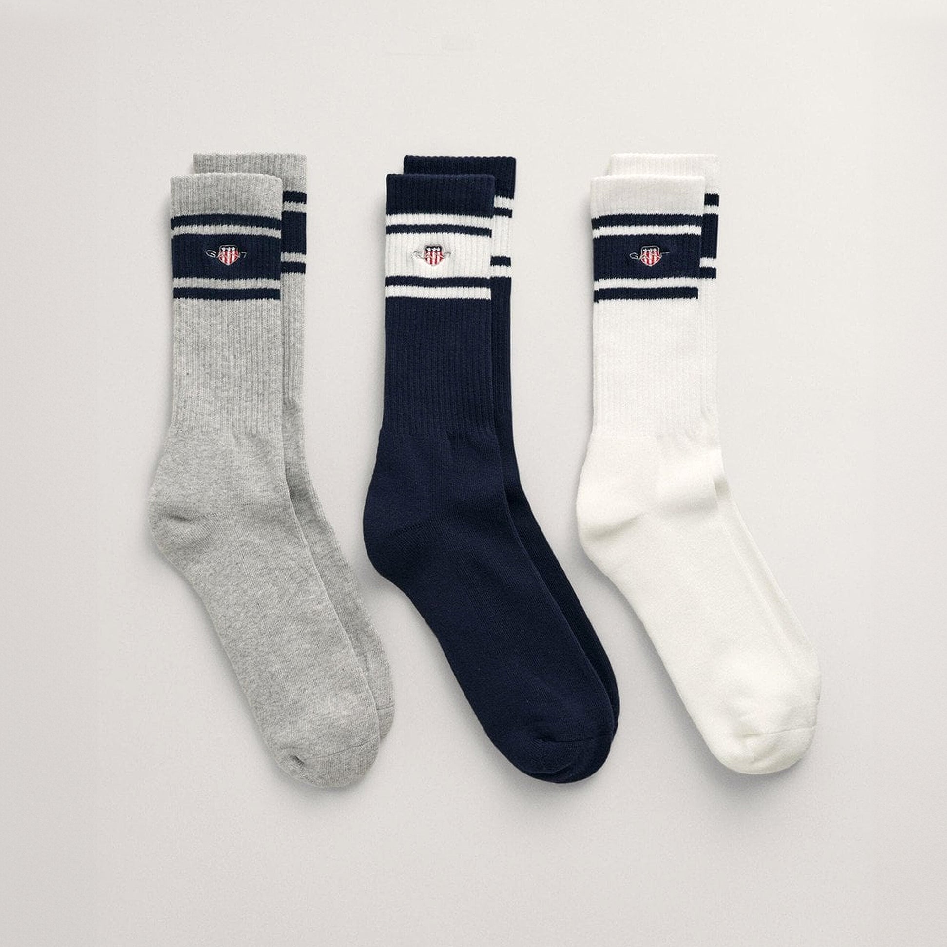 GANT SHIELD SOCKS 3-Pack Mens Sport Socks Evening Blue detail view of three pairs in grey, navy, and white with stripes.