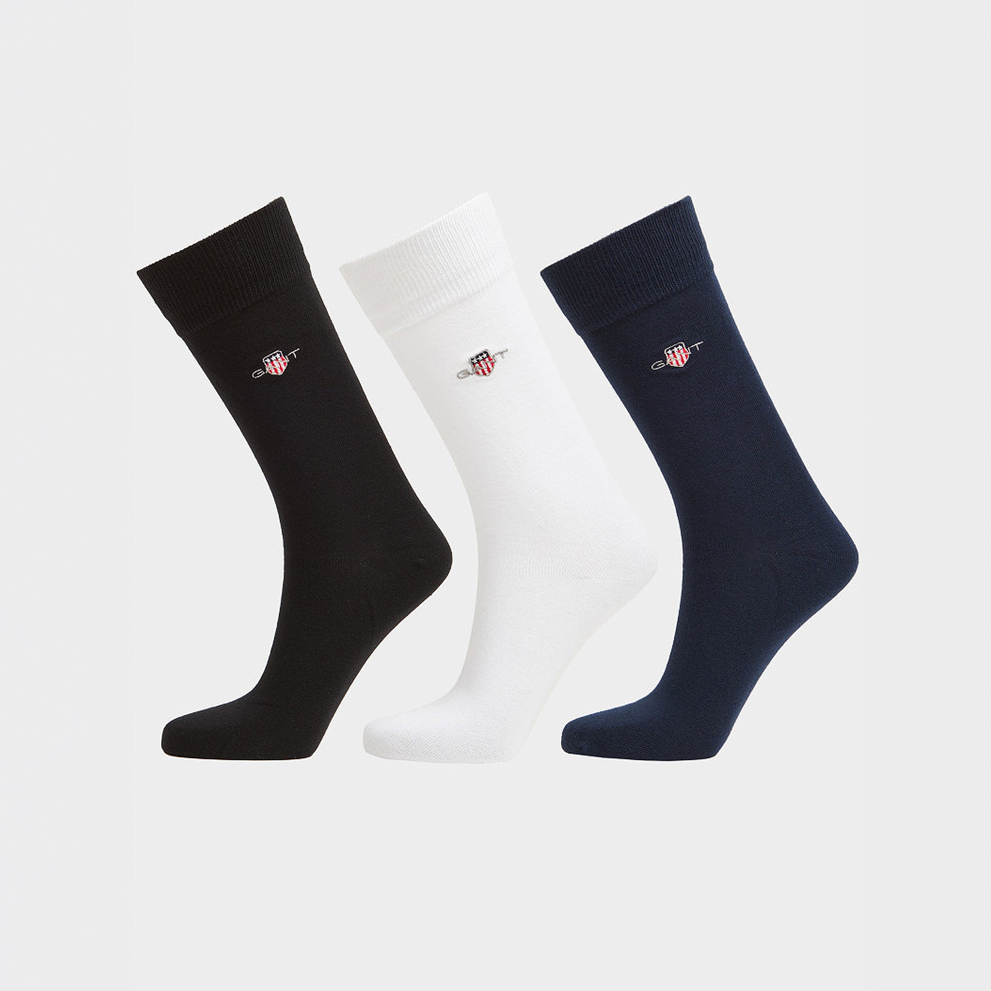 GANT SHIELD SOCKS 3-Pack Mens Black side view showcasing black, white, and navy crew socks.