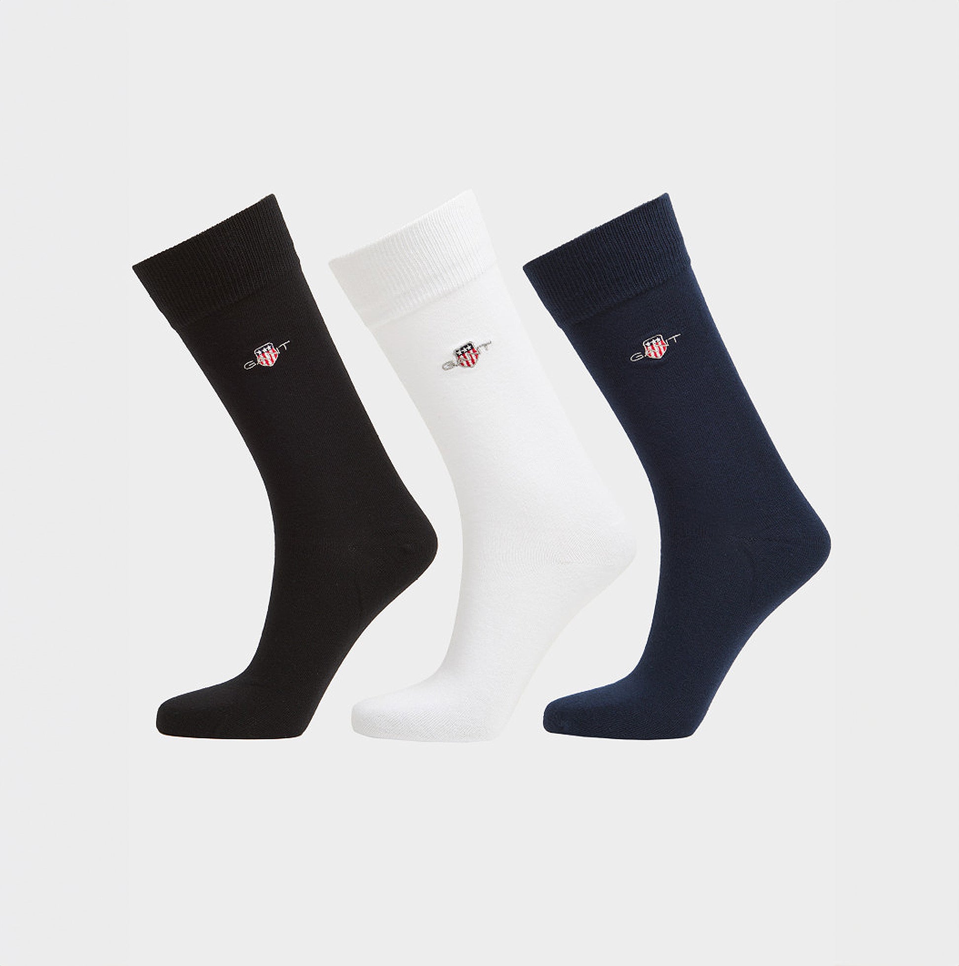 GANT SHIELD SOCKS 3-Pack Mens Black side view showcasing black, white, and navy crew socks.