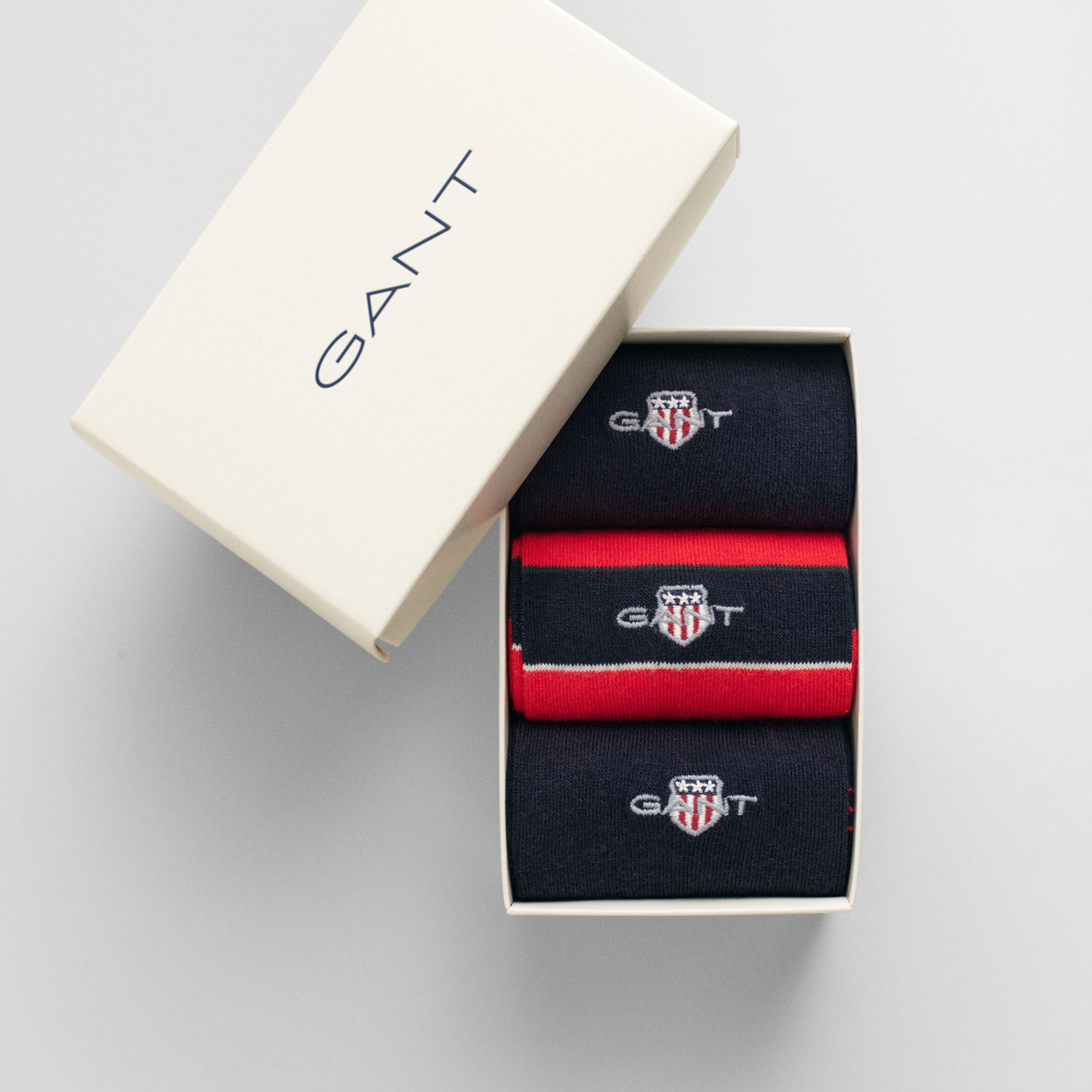 GANT SHIELD TIE STRIPE SOCKS 3-Pack Mens Bright Red in gift box, top view showcasing three pairs of socks.