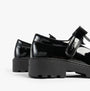 GEOX J CASEY GIRL Girls Black side view of patent leather school shoes with touch fasten closure.