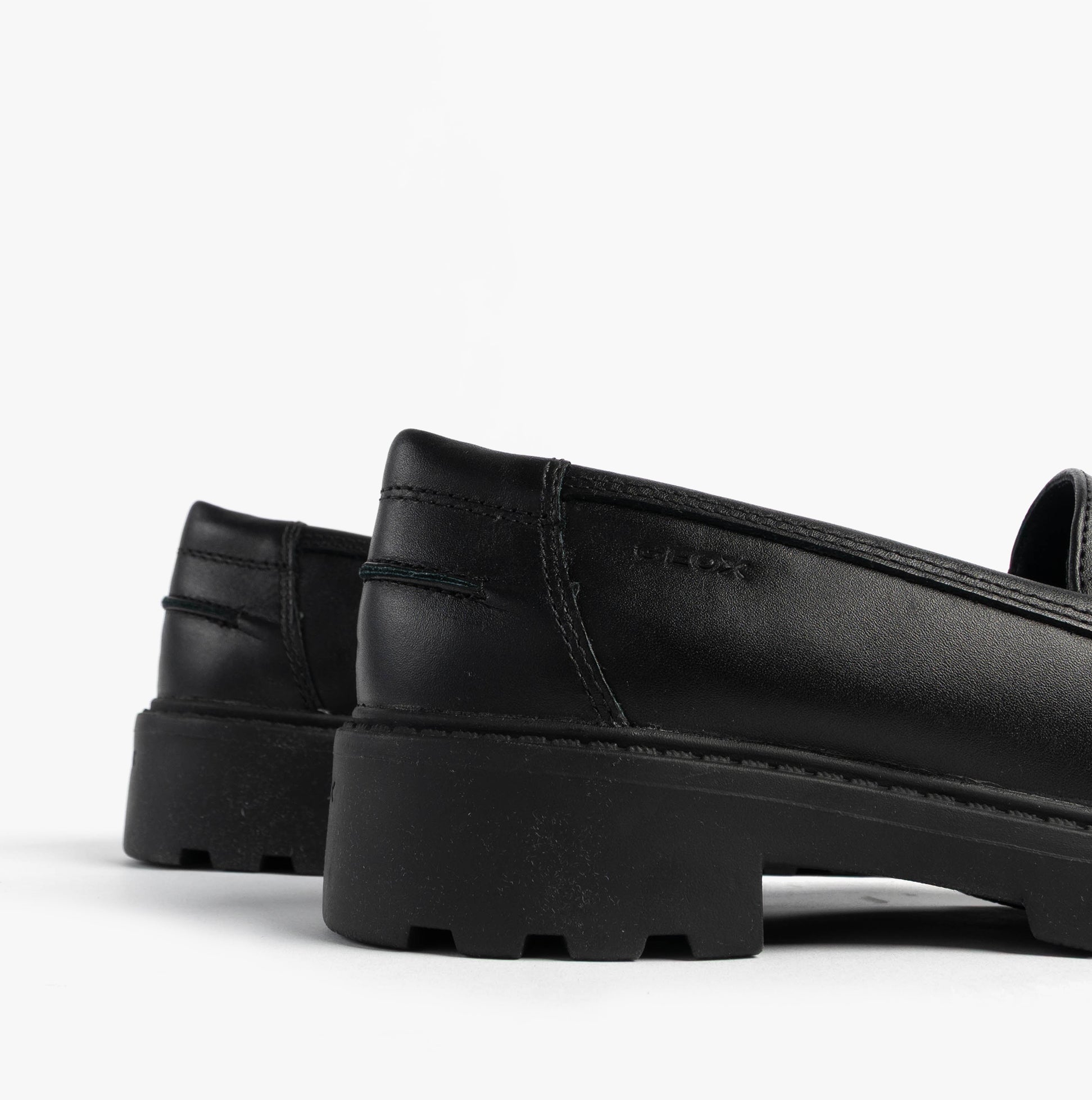 GEOX J CASEY GIRL Girls Black shoe side view showing synthetic upper and low heel.