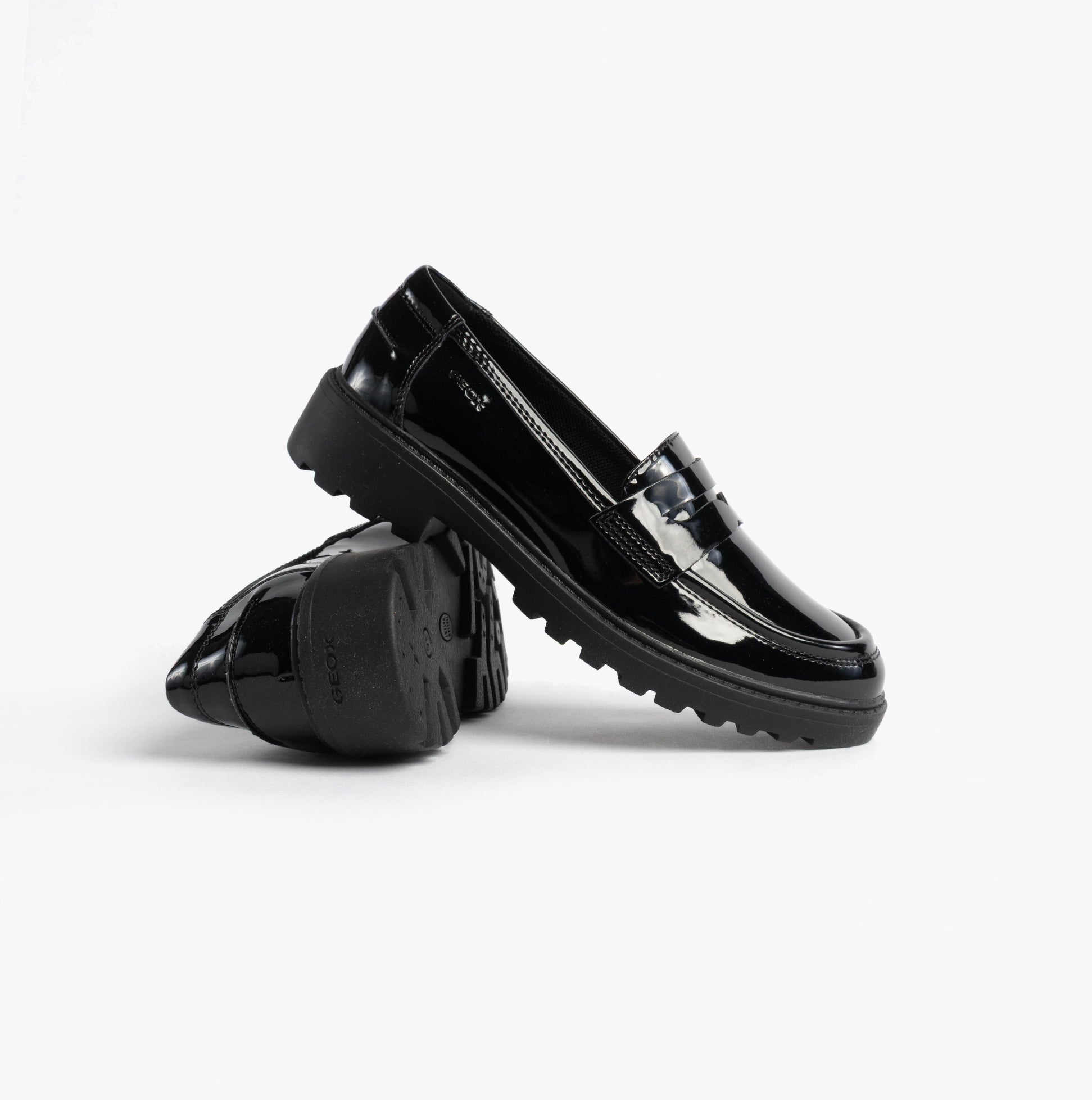 GEOX J CASEY GIRL Girls Black side view of stylish black school shoes with a glossy finish.