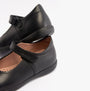 GEOX J NAIMARA Girls Shoes Black side view showcasing leather upper and touch fasten closure.