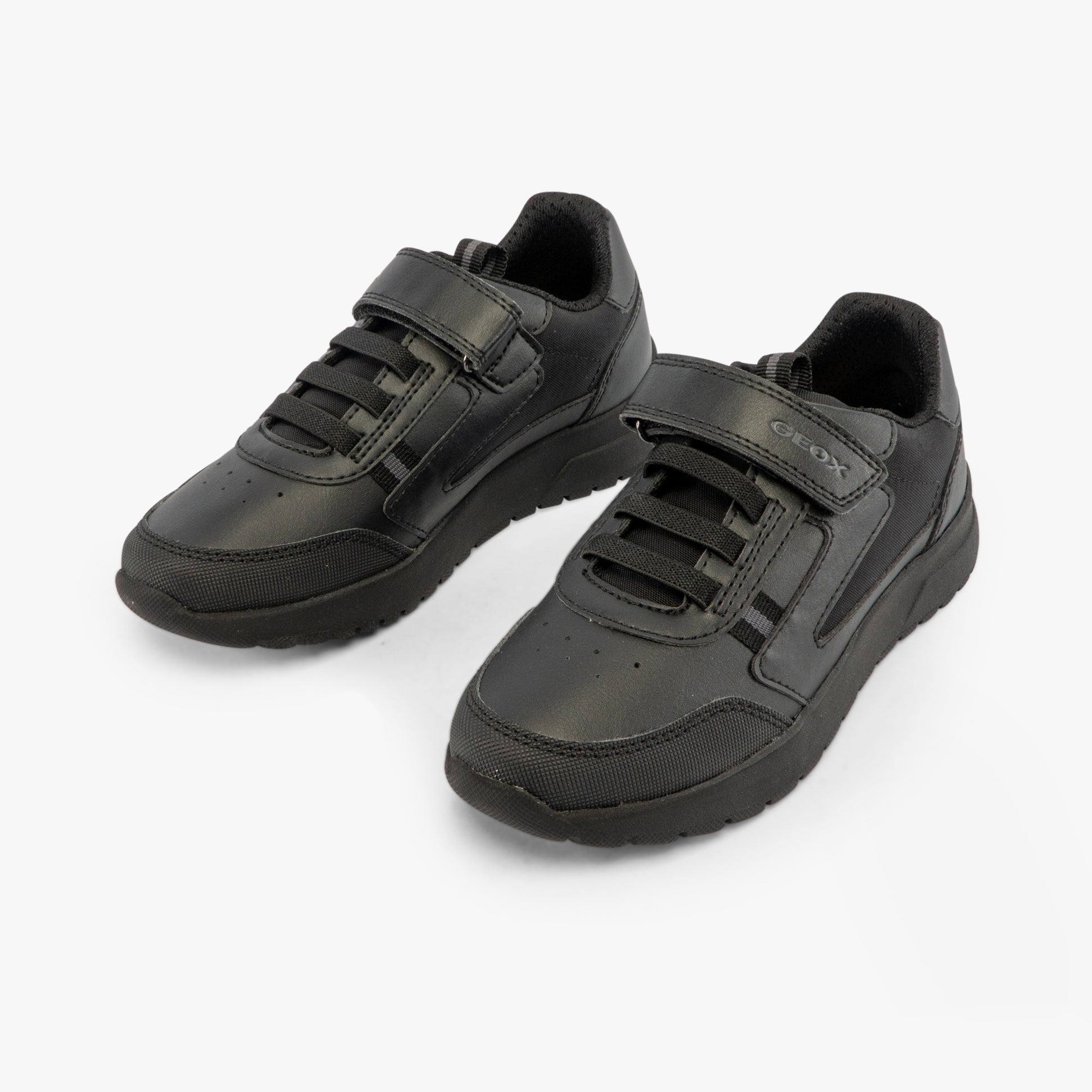 GEOX J BRIEZEE Boys Trainers Black, side view of black synthetic leather school shoes with lace-up closure.
