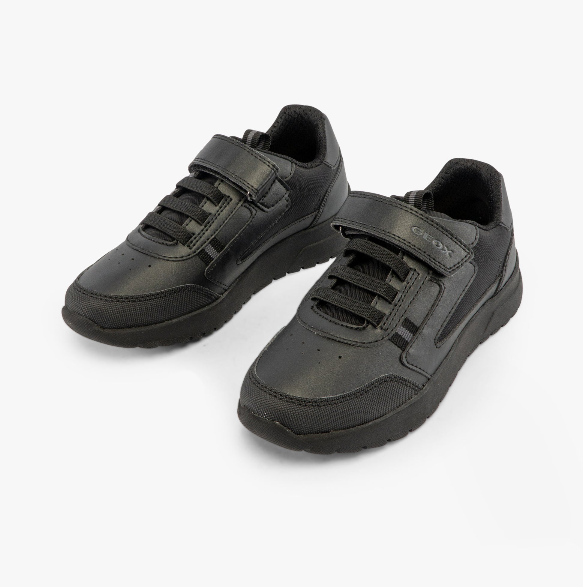 GEOX J BRIEZEE Boys Trainers Black, side view of black synthetic leather school shoes with lace-up closure.