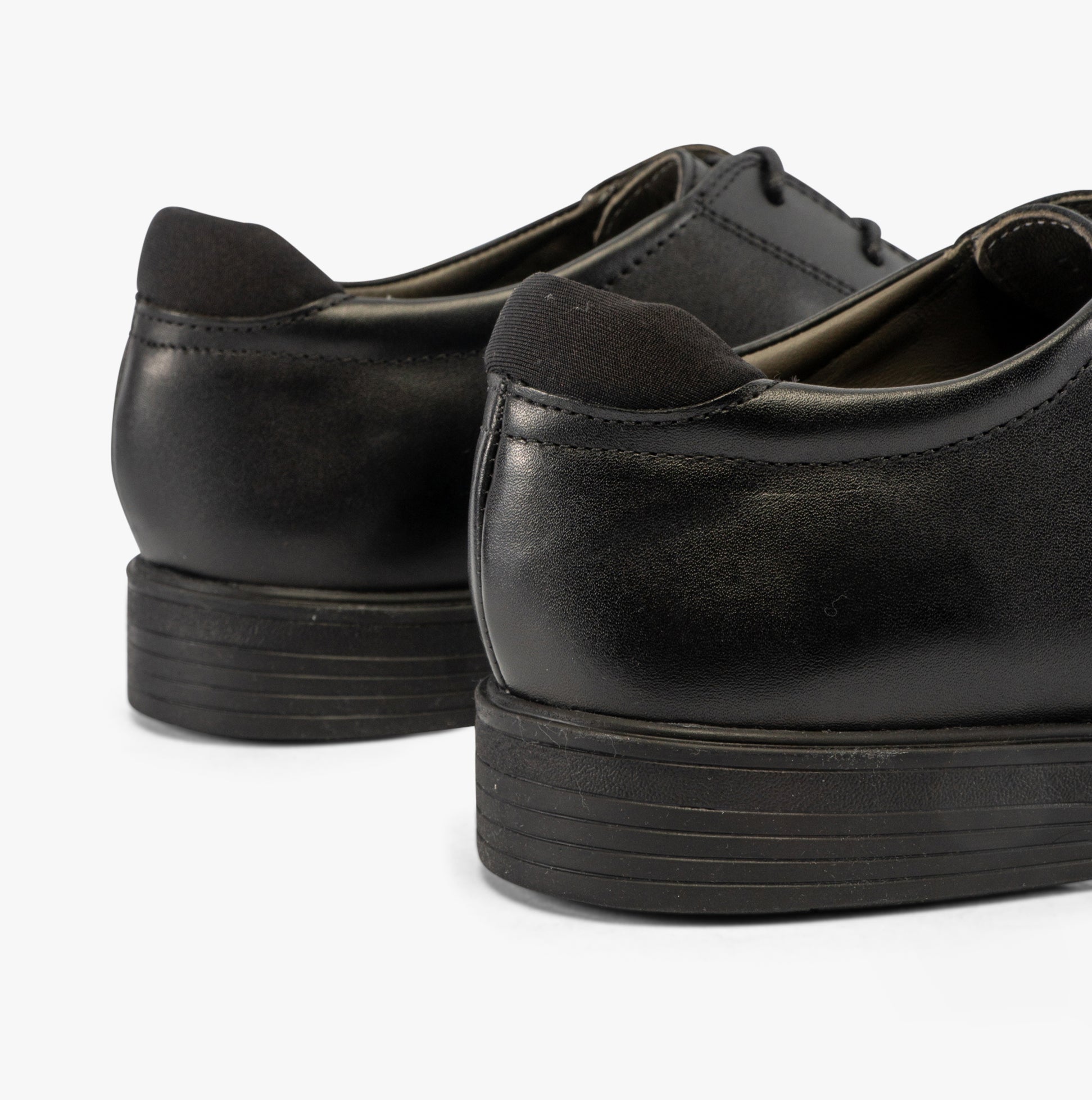 GEOX J ZHEENO Boys Shoes Black rear view showcasing leather upper and block heel design.