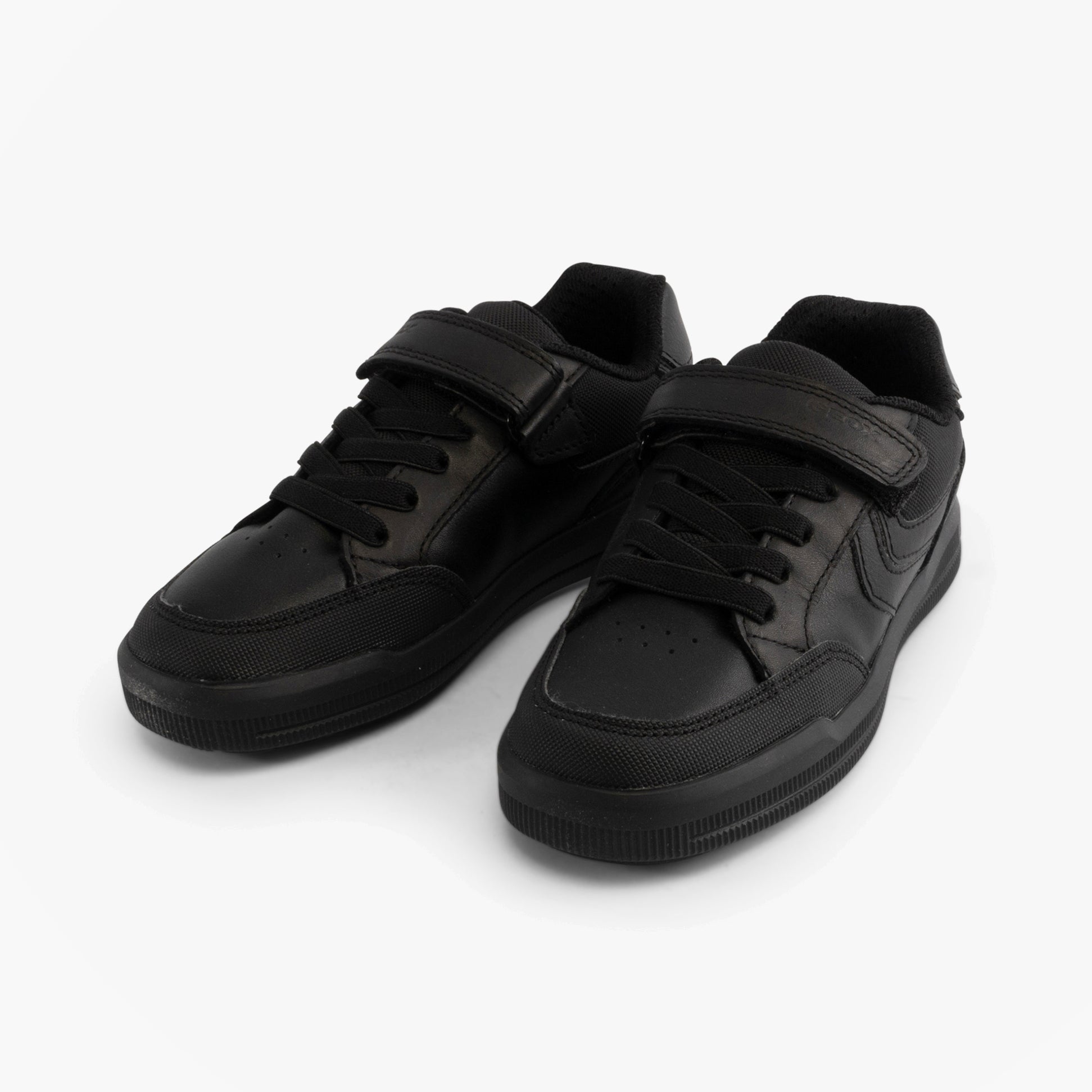 GEOX J ARZACH Boys School Shoes Black side view showcasing leather and textile upper, touch fastening, and rubber sole.