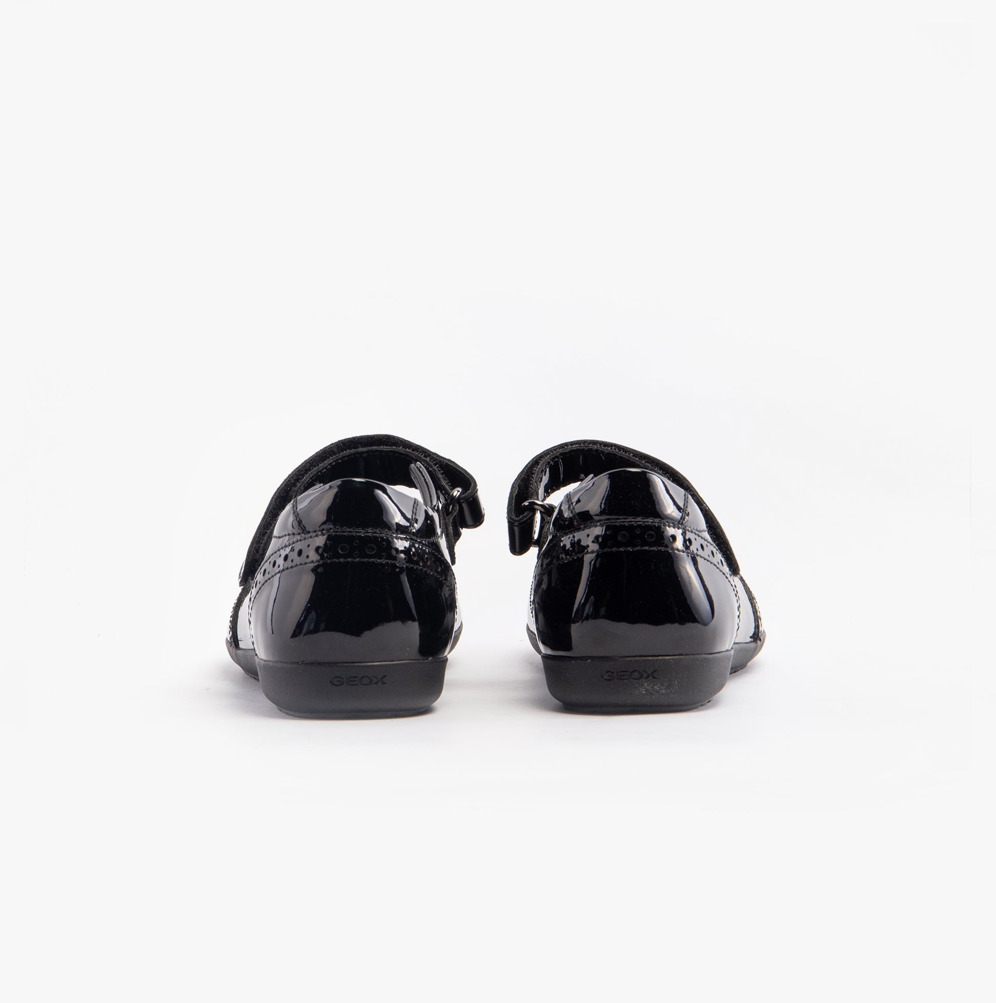 GEOX J IBERIDE Girls Shoes Black rear view with touch fasten closure and glossy leather finish.