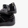 GEOX J IBERIDE Girls Shoes Black rear view showcasing glossy patent leather finish and touch fastening strap.