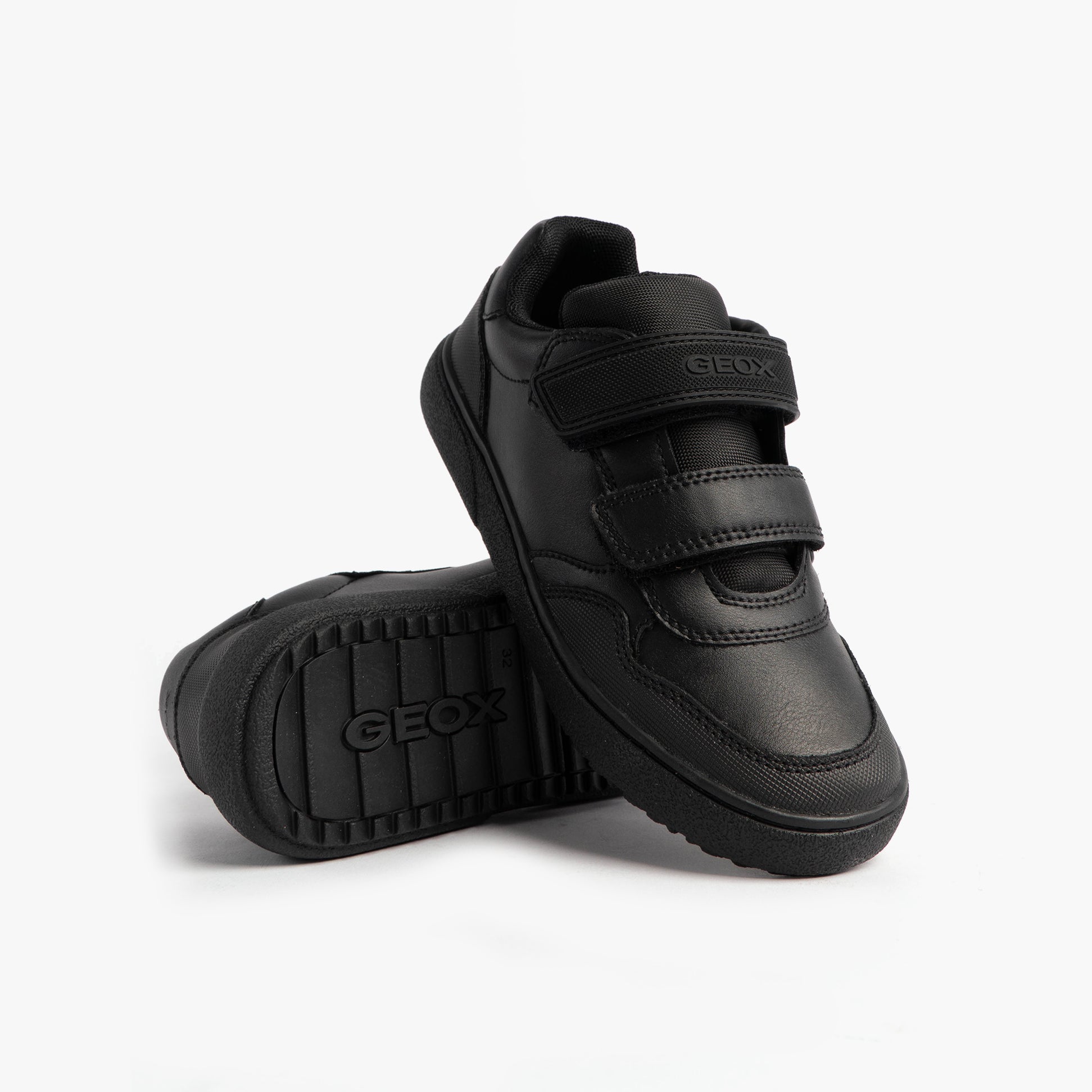 GEOX J THELEVEN BOY Unisex Kids Black shoes side view with touch fasten straps and rubber sole.
