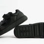 GEOX J THELEVEN BOY Unisex Kids Black side view showing leather upper and rubber sole.