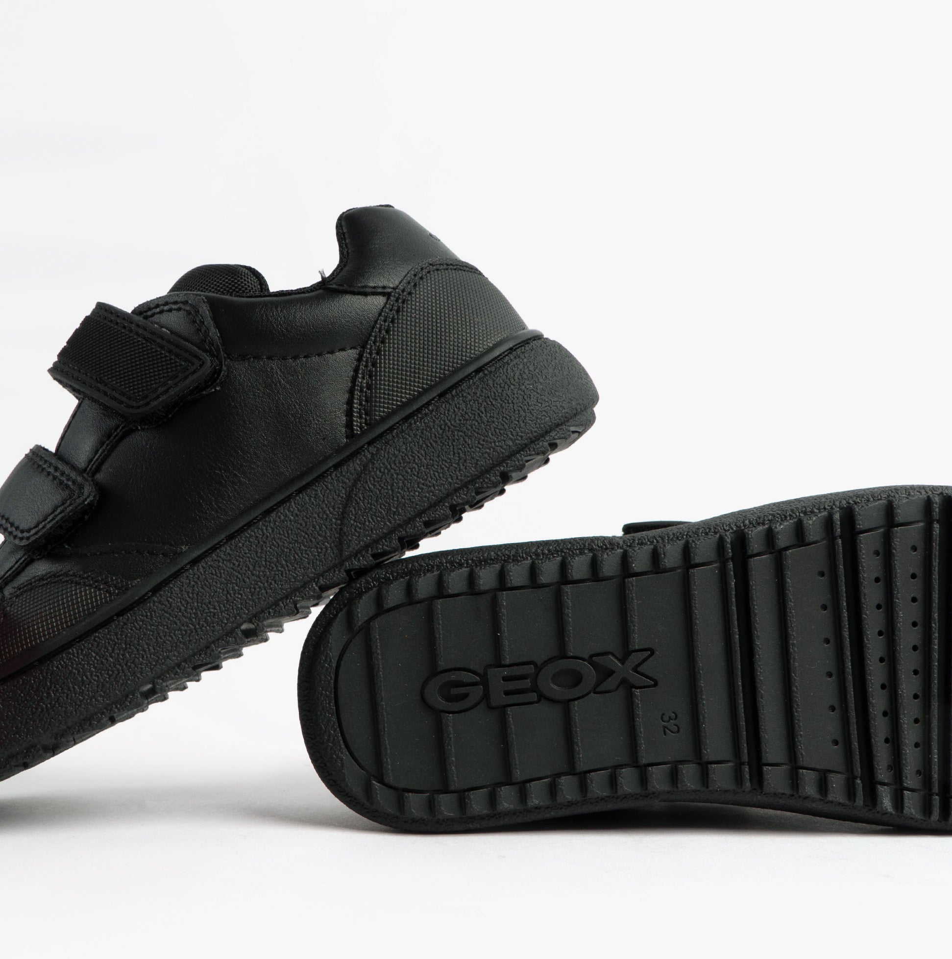 GEOX J THELEVEN BOY Unisex Kids Black side view showing leather upper and rubber sole.