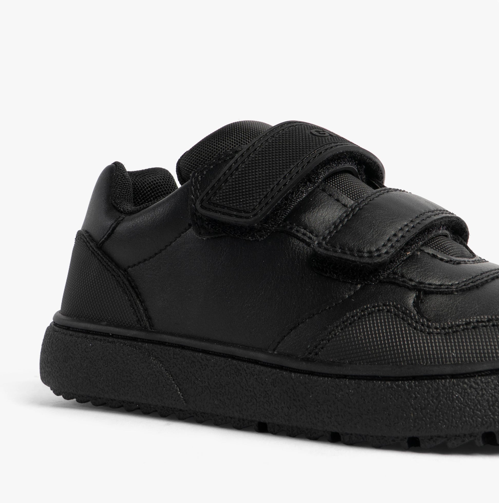 GEOX J THELEVEN BOY Unisex Kids Black side view showing black leather shoes with touch fastening.