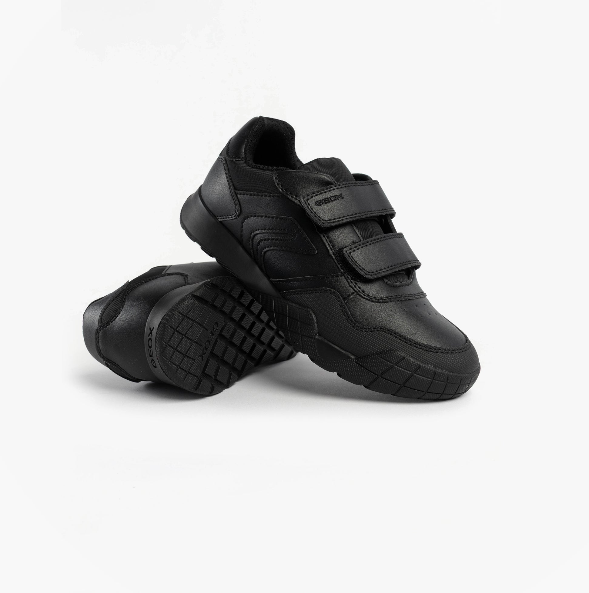 GEOX J RANN-E BOY Unisex Kids Touch Fasten Trainers Black side view showing black synthetic upper and touch fasten straps