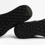 GEOX J RANN-E BOY Unisex Kids Touch Fasten Trainers Black sole view showcasing the textured grip and brand logo.