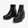 Gabor UTOPIA Womens Ankle Boots Black side view showcasing leather upper, wedge heel, and zip closure.