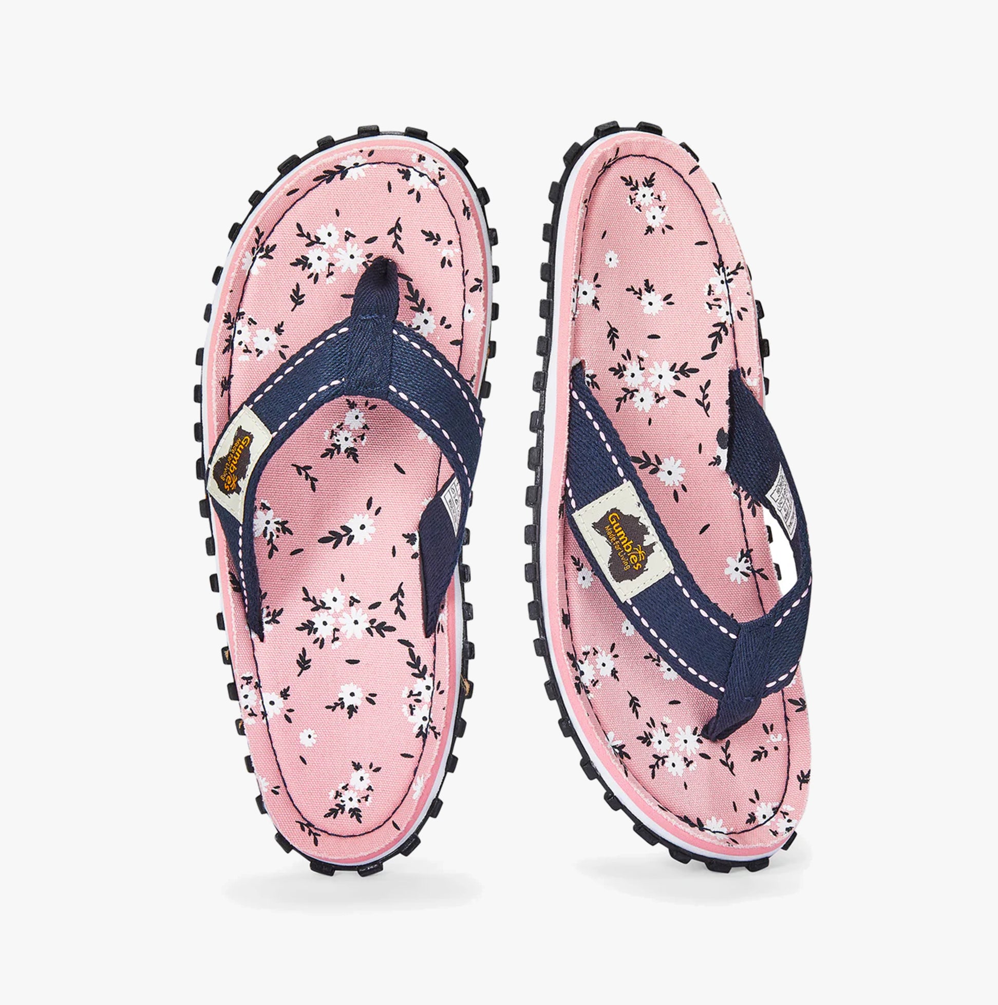 Gumbies FFISL046 ISLANDER Ladies Flip-Flops Ditsy, top view showing floral pattern and navy straps on pink background.