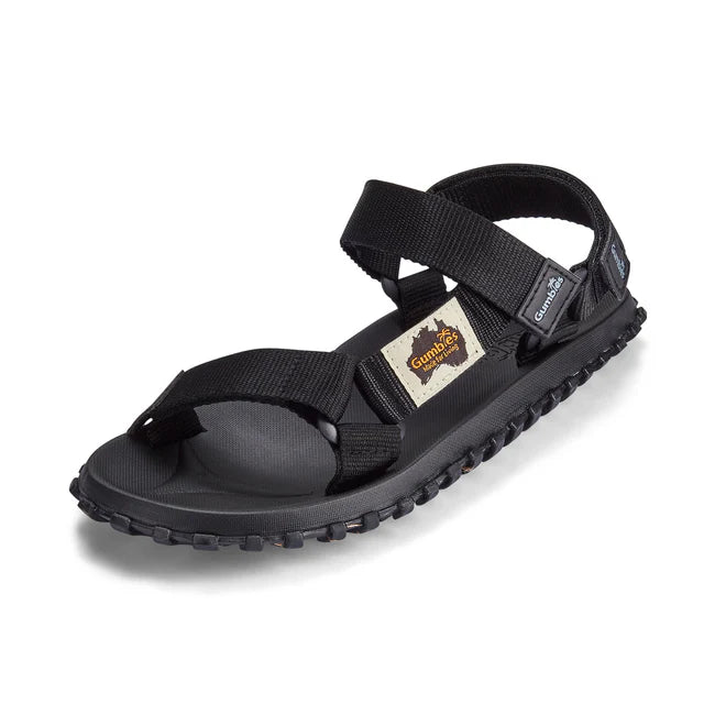 Gumbies SCRAMBLER Unisex Sandals Black side view showcasing straps, contoured footbed and recycled rubber sole.