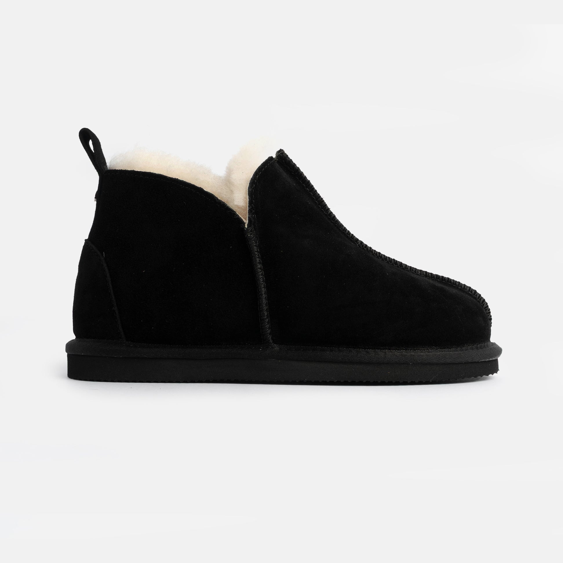 HOS Sheepskin TIA Womens Boot Slippers Black side view showcasing the soft sheepskin lining and stylish design.