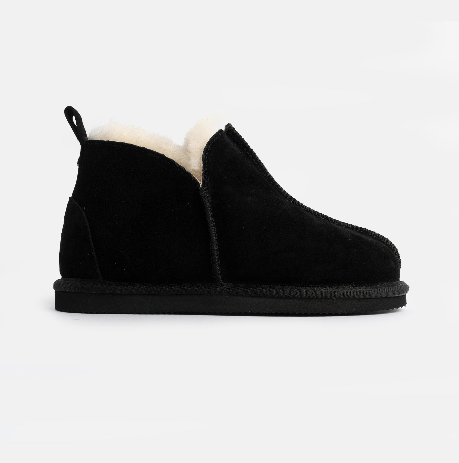 HOS Sheepskin TIA Womens Boot Slippers Black side view showcasing the soft sheepskin lining and stylish design.