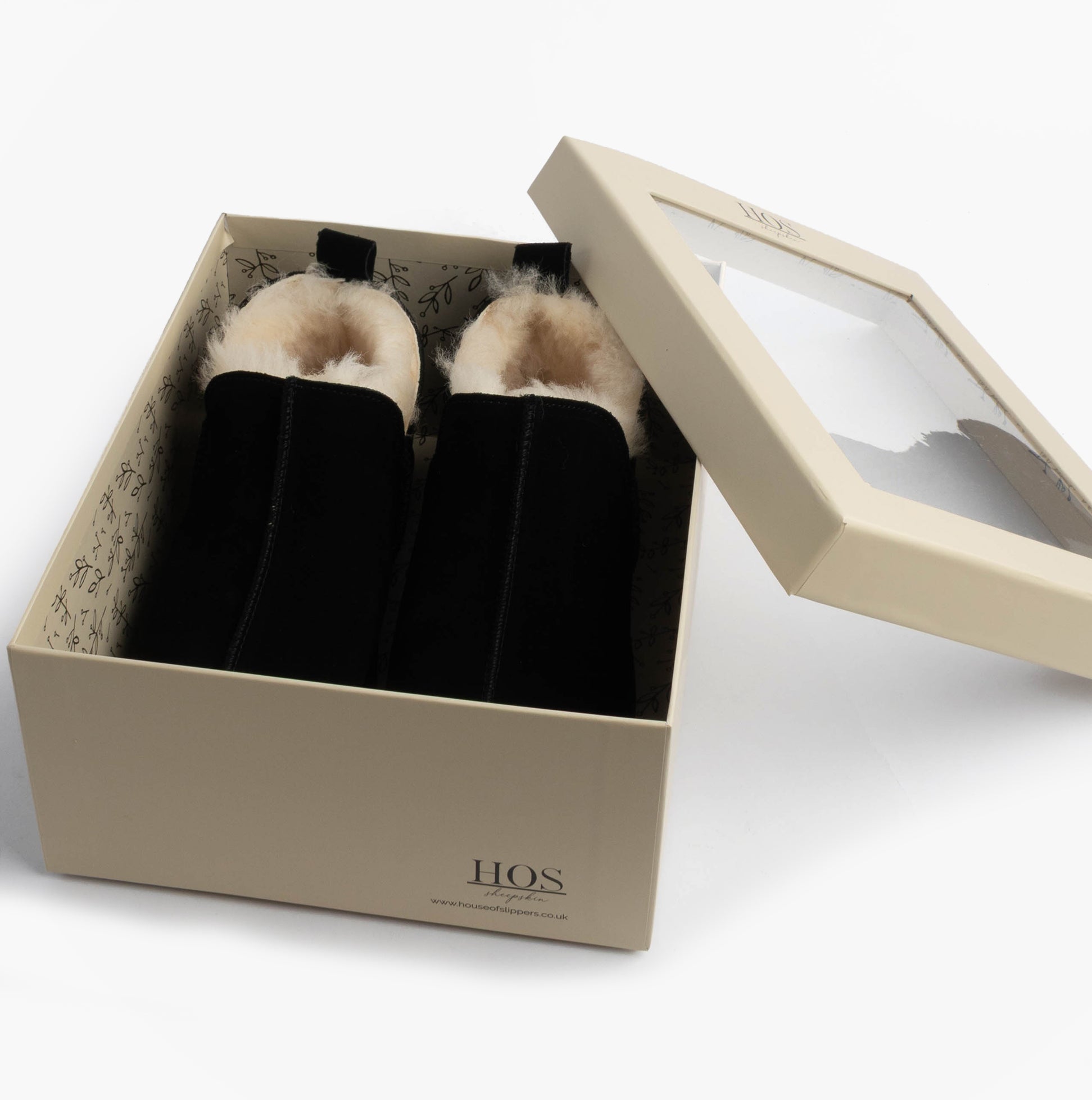 HOS Sheepskin TIA Womens Boot Slippers Black in gift box, showcasing the black slipper boots with sheepskin lining.