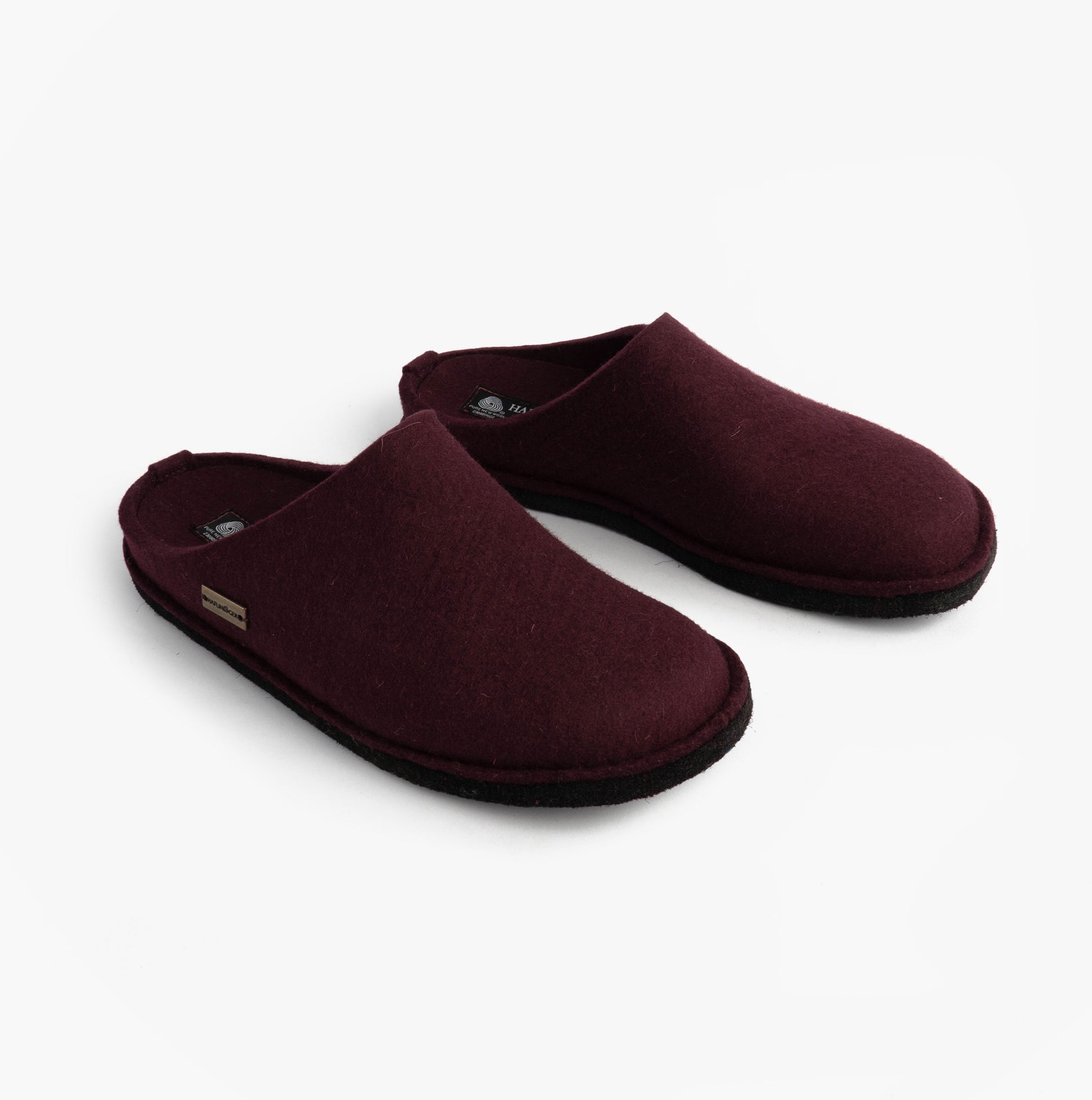 Haflinger SOFT Womens Slippers Bordeaux side view showing soft textile upper and rubber sole, cozy slip-on mules.