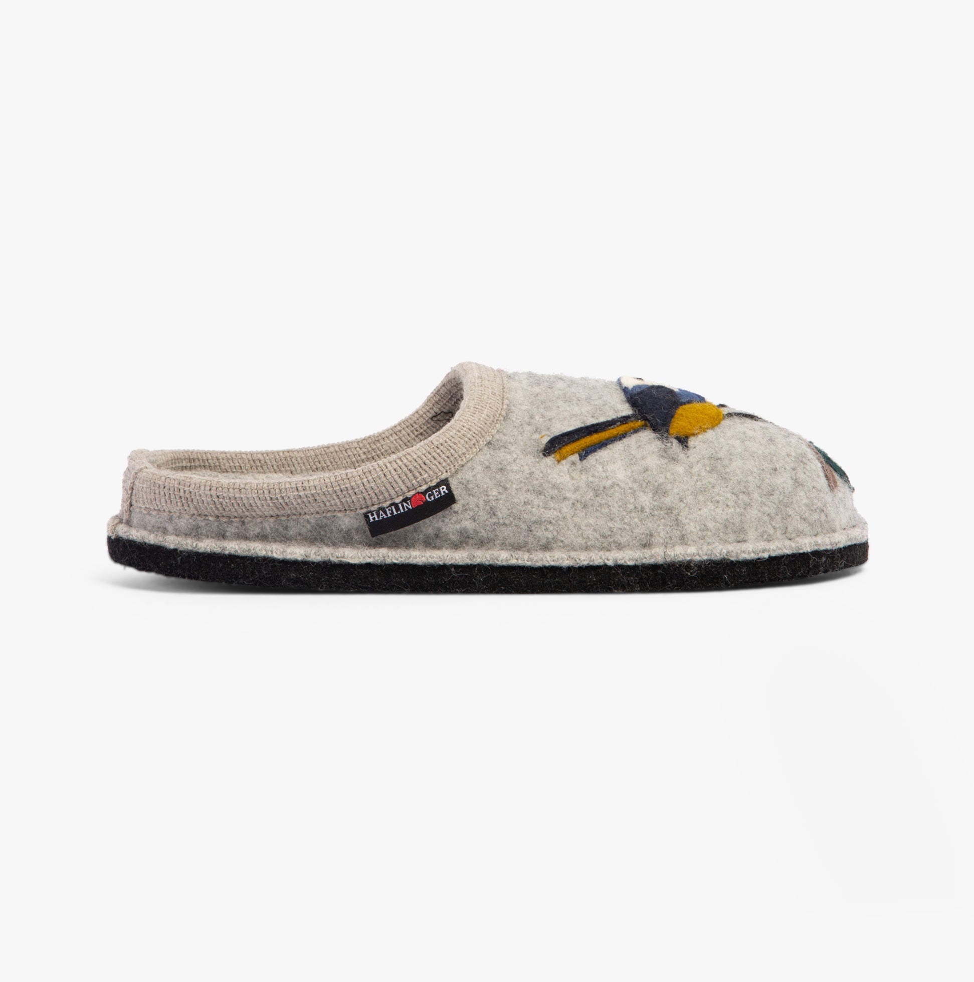 Haflinger SONGBIRD Womens Slippers Mottled Stone Grey side view showing wool upper and round toe design.