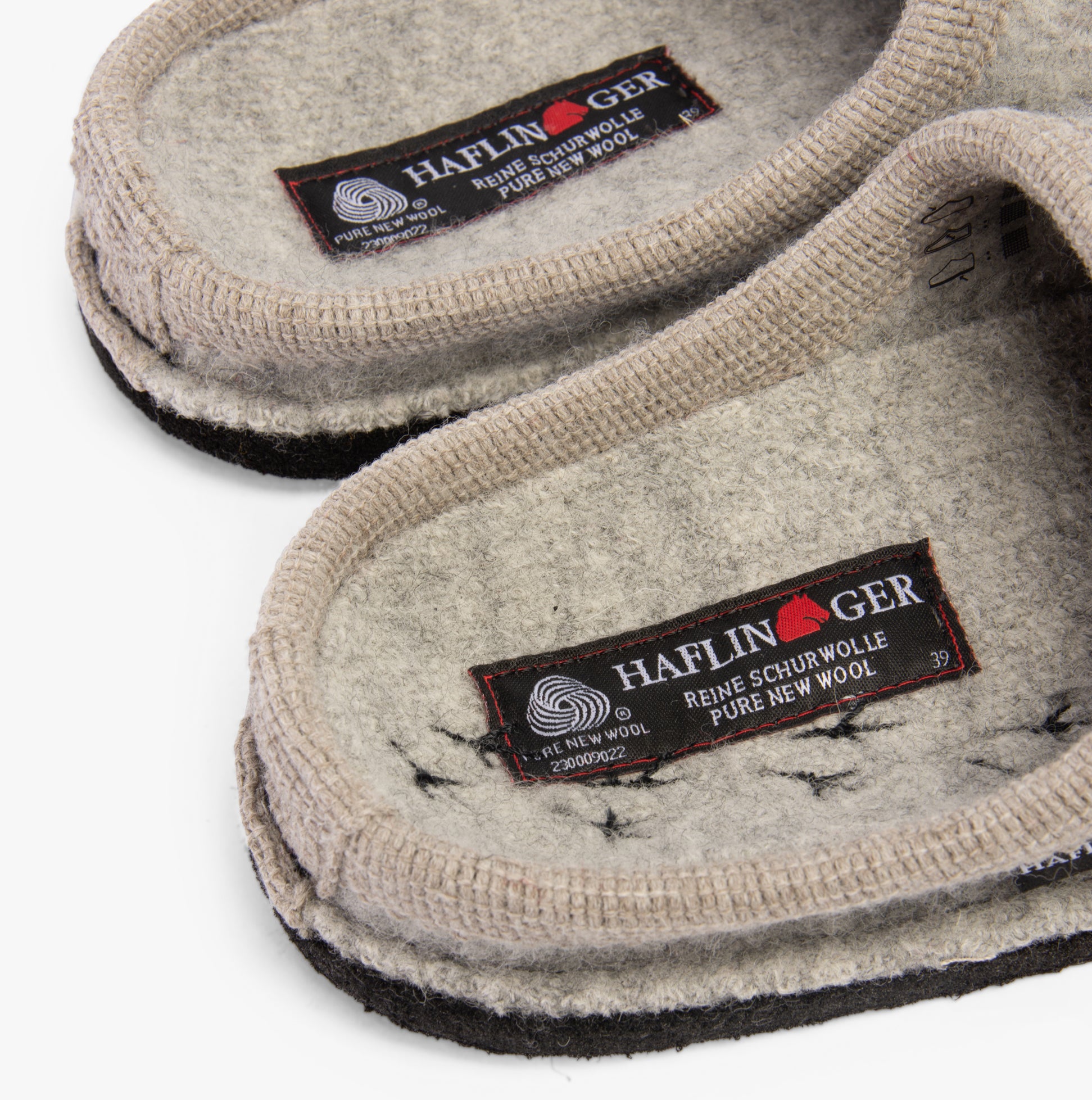 Haflinger SONGBIRD Womens Slippers Mottled Stone Grey close-up view showing wool lining and brand label.