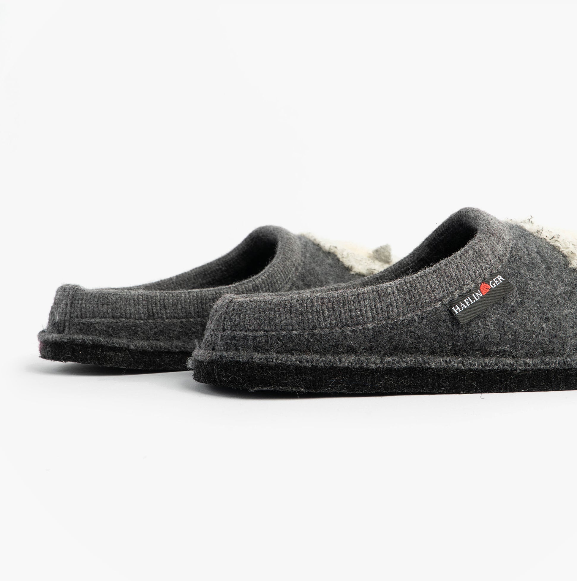 Haflinger LAMBY Womens Slippers Anthracite side view showing comfortable slip-on mules with round toe and textile upper.