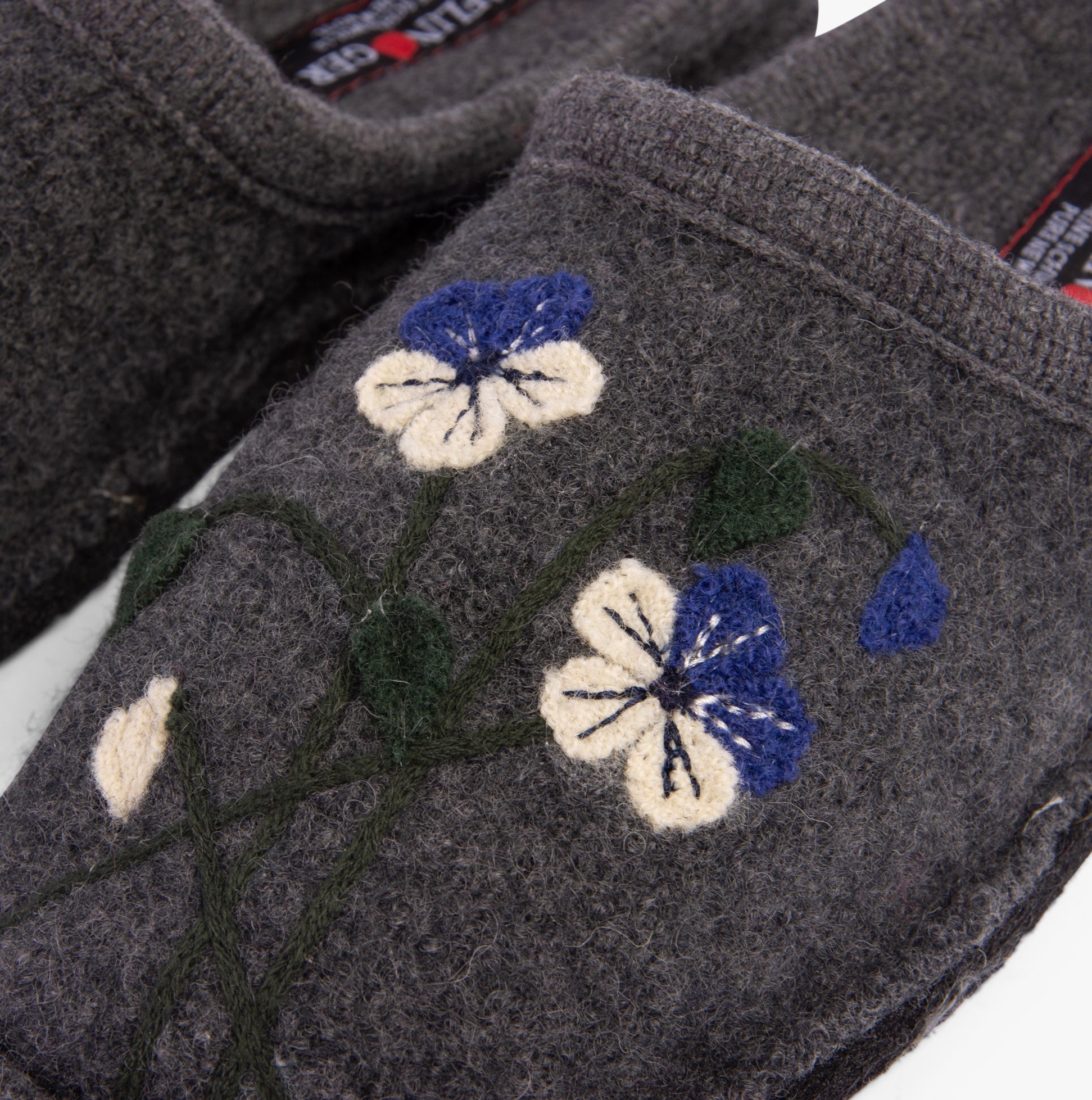 Haflinger VIOLA Womens Slippers Anthracite detail view with floral embroidery on wool upper.