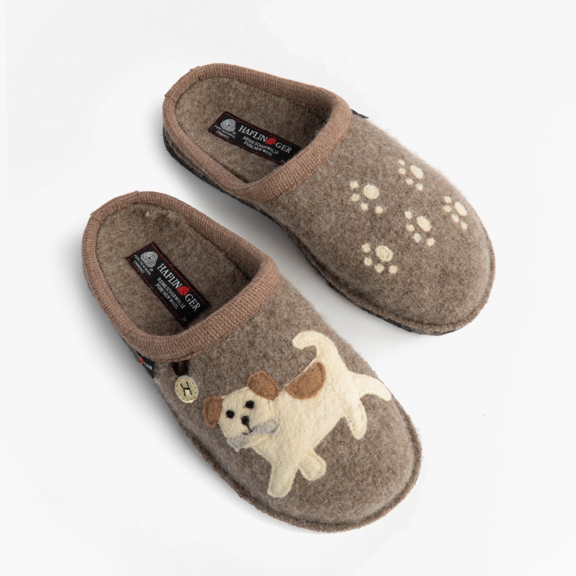 Haflinger FIDO Womens Slippers Beige top view showing dog design and paw prints on textile upper.